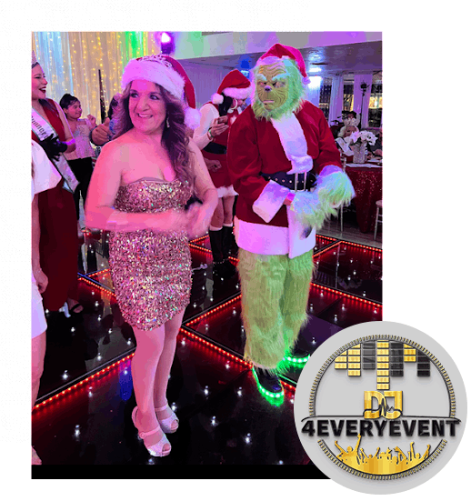 A woman and man in santa costumes on the dance floor.